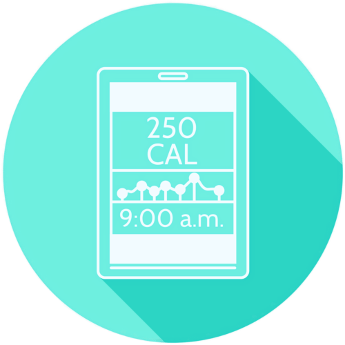 A finger-prick blood test is performed on a table. Several blood vials with coloured tops are sat in a health blood test delivery box.